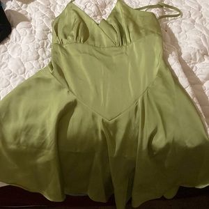 It’s a small light green dress brand unknown.